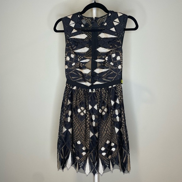 BCBGMaxAzria Dresses & Skirts - BCBG MaxAzria Black Lace Dress with Cream Underlay Size 0